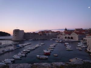 a group of boats in the water in a harbor at Apartment P 35 in Dubrovnik