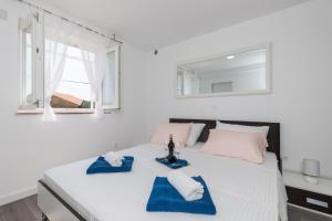Posteľ alebo postele v izbe v ubytovaní Apartment Semi