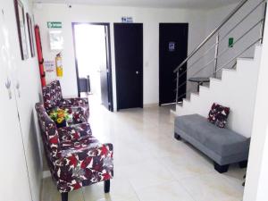 Χώρος καθιστικού στο Hotel Cosmos Sincelejo