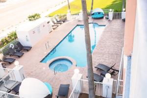 an overhead view of a pool at a hotel at Grand Beach Resort Unit 313 in Gulf Shores