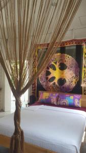 Giường trong phòng chung tại Peace home kpg
