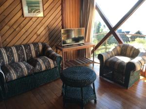 Posezení v ubytování Cabañas Puerto Chalhuaco