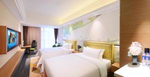 TV o dispositivi per l'intrattenimento presso Hampton by Hilton Zhuhai Cheng Feng Plaza