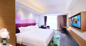 TV o dispositivi per l'intrattenimento presso Hampton by Hilton Zhuhai Cheng Feng Plaza