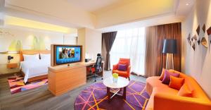 TV o dispositivi per l'intrattenimento presso Hampton by Hilton Zhuhai Cheng Feng Plaza