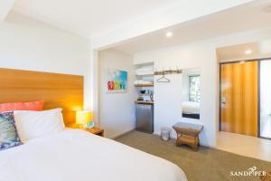 Krevet ili kreveti u jedinici u okviru objekta Sandpiper Motel Apollo Bay
