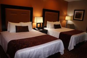 Postel nebo postele na pokoji v ubytování Best Western Plus Zion West