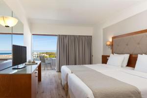 Postel nebo postele na pokoji v ubytování Best Western Plus Hotel Plaza