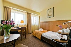 Cama ou camas em um quarto em Best Western Vilnius