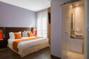 Postel nebo postele na pokoji v ubytování Best Western Seine West Hotel