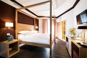 Postel nebo postele na pokoji v ubytování Hotel Michelangelo & Day SPA