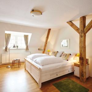 Postel nebo postele na pokoji v ubytování Hotel Hof Tütsberg