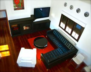 TV a/nebo společenská místnost v ubytování Casa Boo de Piélagos - Playa de Liencres