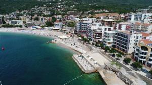 an aerial view of a beach in a city at Apartments Palma in Dobra Voda