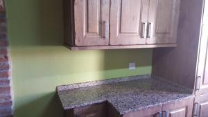 Kuchyň nebo kuchyňský kout v ubytování Vivienda Vacacional El Navariegu 1