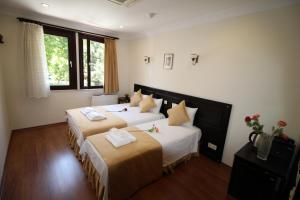 Katil atau katil-katil dalam bilik di Sultans Hotel +41 gambar