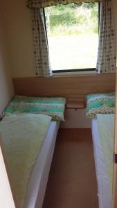 En eller flere senge i et værelse på Rybnik Dalibor
