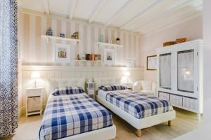 Ein Bett oder Betten in einem Zimmer der Unterkunft Serendipity B&B Pescara