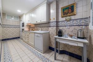 Kuchyň nebo kuchyňský kout v ubytování My Loft 4 You Gran Via