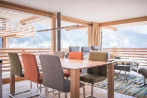 a conference room with a table and chairs at Bernstein in Grindelwald