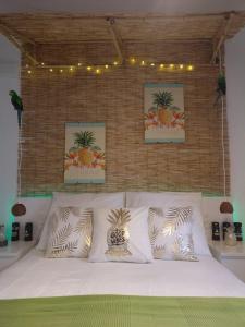 Ένα ή περισσότερα κρεβάτια σε δωμάτιο στο Wonder Rooms Nerja Guest House