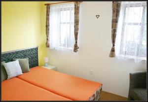 Posteľ alebo postele v izbe v ubytovaní Apartment Šedivý