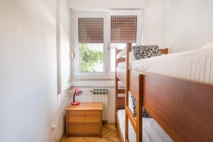Posteľ alebo postele v izbe v ubytovaní Lidia