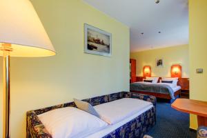 Ένα ή περισσότερα κρεβάτια σε δωμάτιο στο Hotel Elbinsel free parking