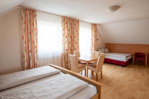 Ein Bett oder Betten in einem Zimmer der Unterkunft Appartementhaus Badria