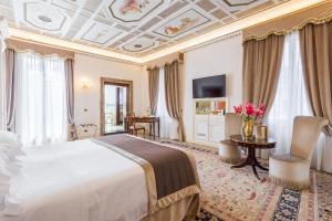 Rúm í herbergi á Hotel Ai Cavalieri di Venezia