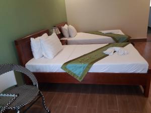 Letto o letti in una camera di Tabii hotel