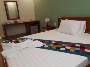Letto o letti in una camera di Tabii hotel