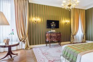 Rúm í herbergi á Hotel Ai Cavalieri di Venezia