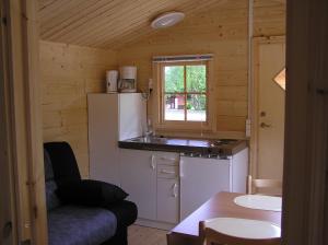 Kuchyň nebo kuchyňský kout v ubytování Nivå Camping & Cottages