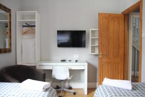 TV a/nebo společenská místnost v ubytování Greenmount Bed and Breakfast