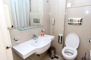 Um banheiro em Hotel Riviera