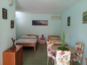 Postel nebo postele na pokoji v ubytování Apartments M&Z