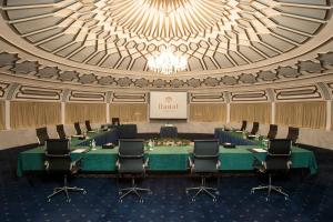 a meeting room with a long table and chairs at Danat Al Ain Resort in Al Ain +64 photos