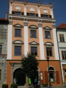 a large building with a clock on top of it at Spillenberg House Main Property 2024 in Levoča