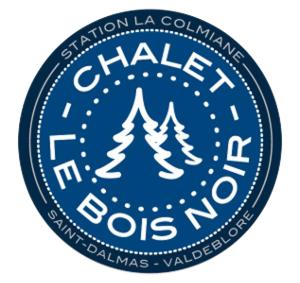 瓦爾代布洛爾的住宿－Chalet Le Bois Noir，带有 ⁇ 头的徽章