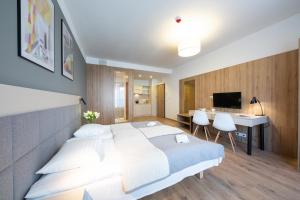 Posteľ alebo postele v izbe v ubytovaní Apartments "Wolska Residence"