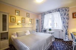 Letto o letti in una camera di Karlsbad Grande Madonna