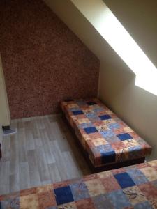Postel nebo postele na pokoji v ubytování Chata u rybníka