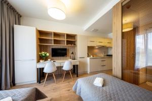Kuchyňa alebo kuchynka v ubytovaní Apartments "Wolska Residence"