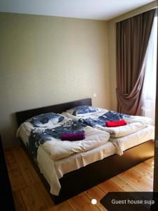Katil atau katil-katil dalam bilik di Guesthouse Suja