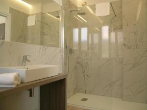 Um banheiro em Hotel Belvedere