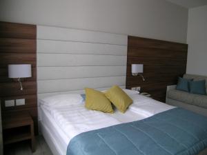 Cama ou camas em um quarto em Hotel Belvedere