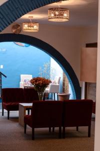 Uma área de estar em Cooper Hotel Boutique