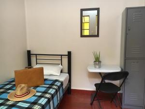 Una cama o camas en una habitación de Hostal Andaina