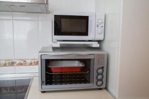 Kuchyň nebo kuchyňský kout v ubytování Apartamento Torcal Écija
